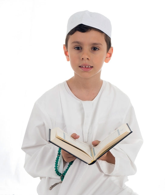 BOY READING QURAN