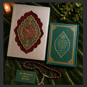 Elegant Islamic wedding gift set featuring exclusive Quran box, The Noble Quran with transliteration and English translation, and red tasbih beads with stainless steel tassels on a beige luxury wedding backdrop.
