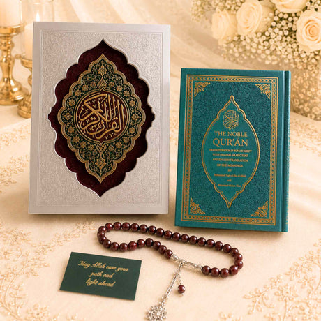 Elegant Muslim wedding keepsake featuring ornate Quran box, teal Noble Quran, red prayer beads with stainless steel tassels, and luxurious cream floral styling for nikah gifting.