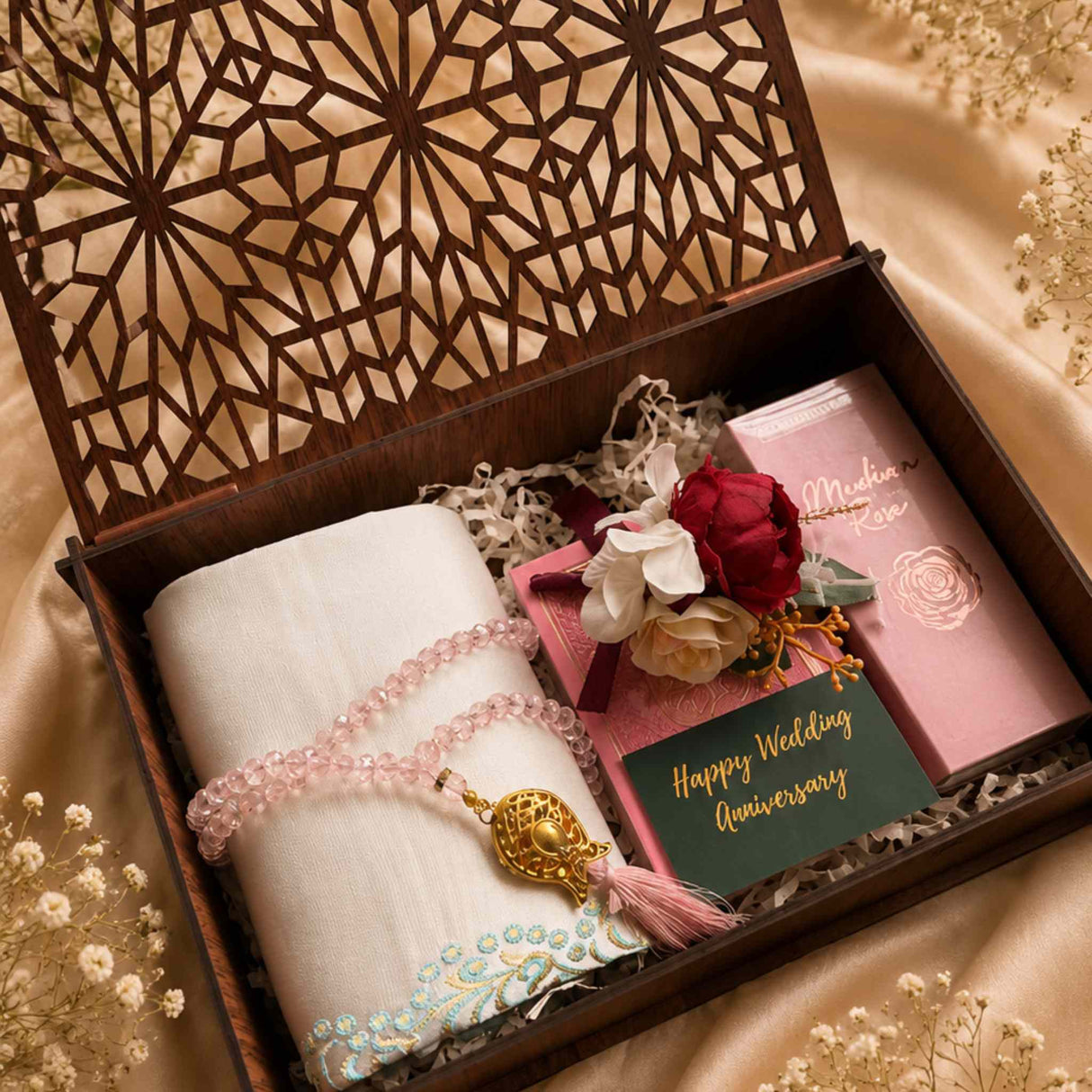 Elegant Islamic nikah gift set in pink tones with Quran prayer essentials and wooden keepsake box