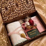 Elegant Islamic nikah gift set in pink tones with Quran prayer essentials and wooden keepsake box