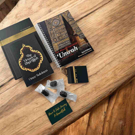 Islamic pilgrim preparation gift box with Umrah guide, Dhul Hijjah book and Sunnah Ajwa dates